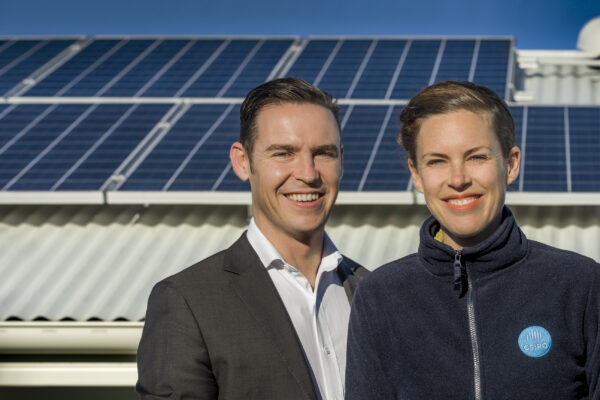 Evergen home storage featuring solar panels and Emlyn Keane, Operations Manager from Evergen, and Natalie Kikken from CSIRO